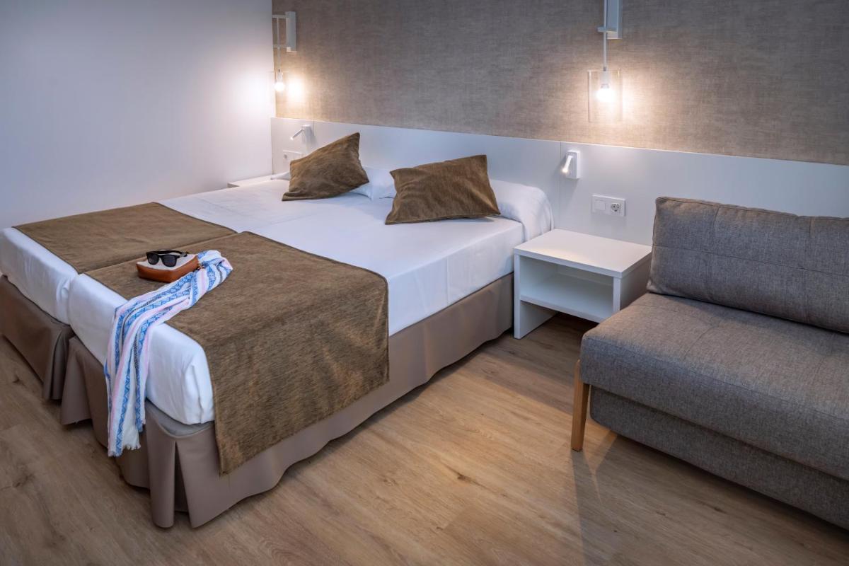 Cama o camas de una habitación en GHT Costa Brava & Spa