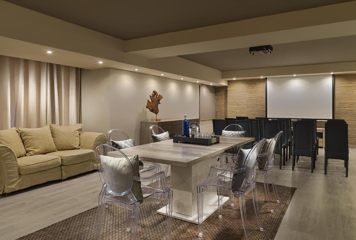 Zona de estar de Royal Garden Villas, Luxury Hotel