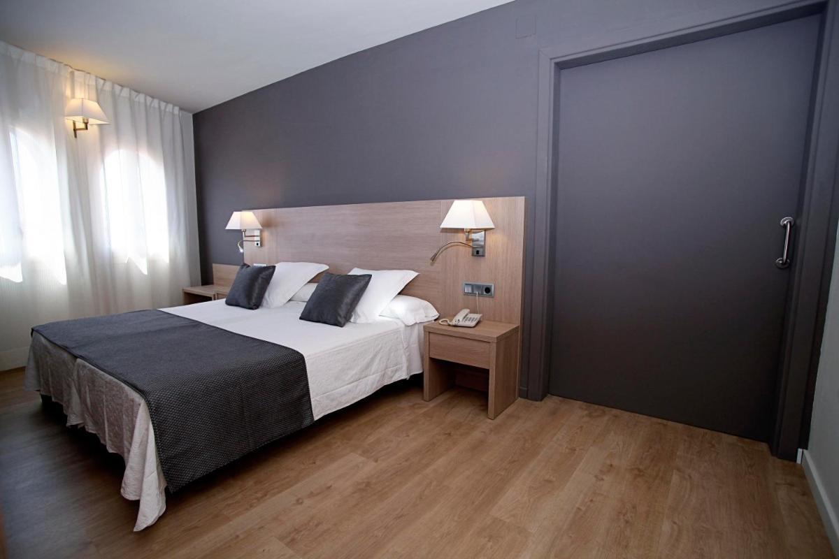Cama o camas de una habitación en Balneari Termes Victòria