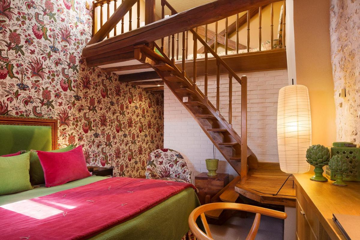 Coin salon dans l'établissement Hotel De France