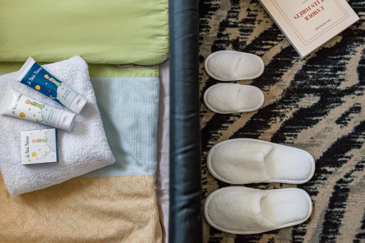 Un ou plusieurs lits dans un hébergement de l'établissement DoubleTree by Hilton Lyon Eurexpo & Spa