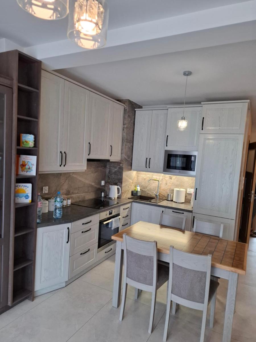 Apartament Wanda-widok jeziora z dachu budynku - Housity
