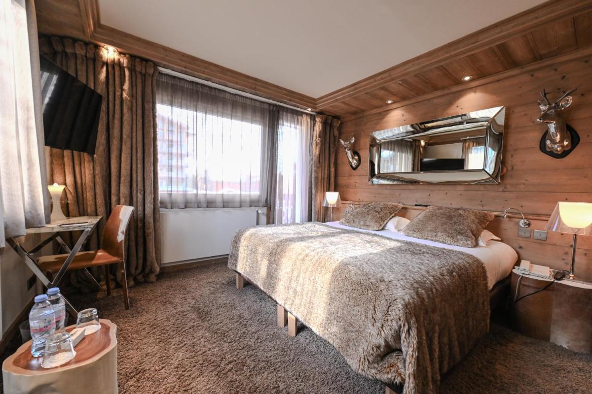 Un ou plusieurs lits dans un hébergement de l'établissement Hotel Tsanteleina
