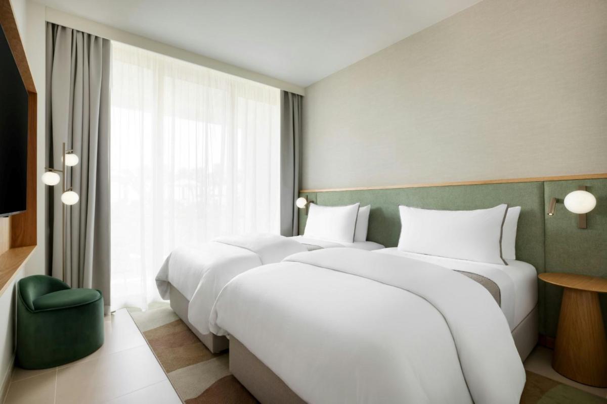 Uma cama ou camas num quarto em The Westin Salgados Beach Resort, Algarve