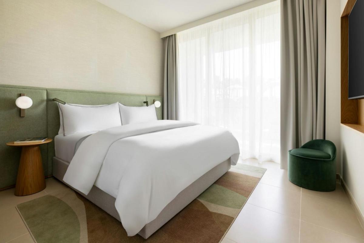 Uma cama ou camas num quarto em The Westin Salgados Beach Resort, Algarve