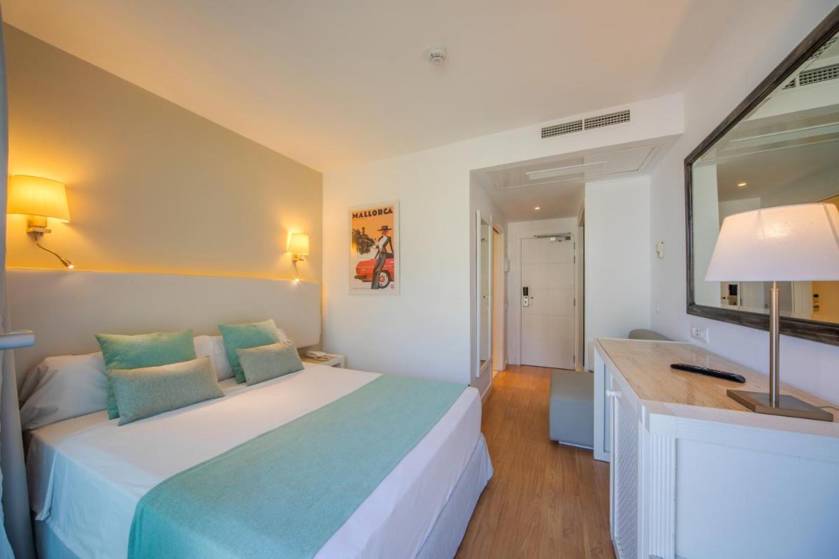 Cama o camas de una habitación en Playa Esperanza Resort Affiliated by Meliá