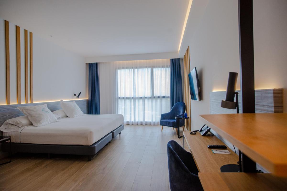 Cama o camas de una habitación en Syncrosfera Fitness & Spa Health Hotel Boutique