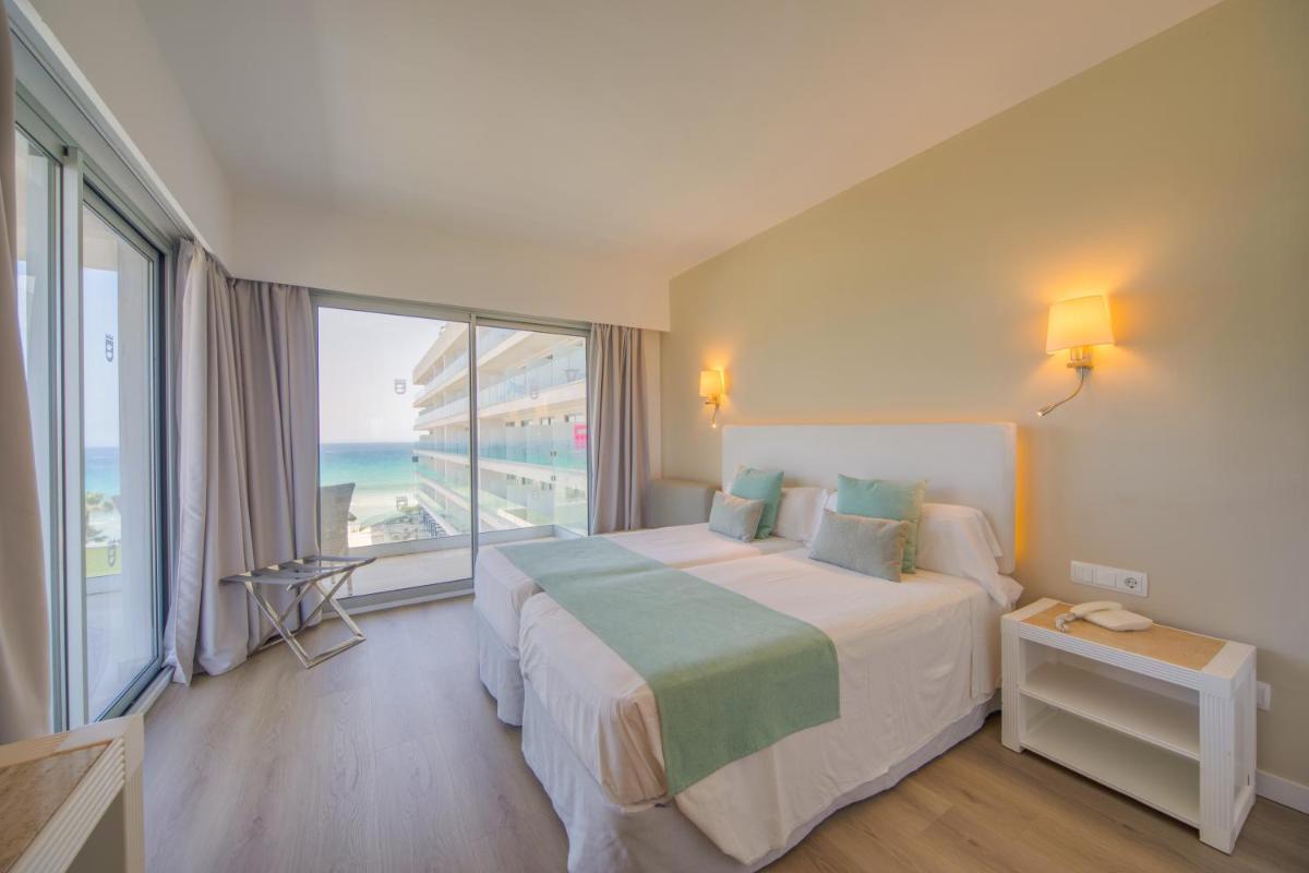 Cama o camas de una habitación en Playa Esperanza Resort Affiliated by Meliá