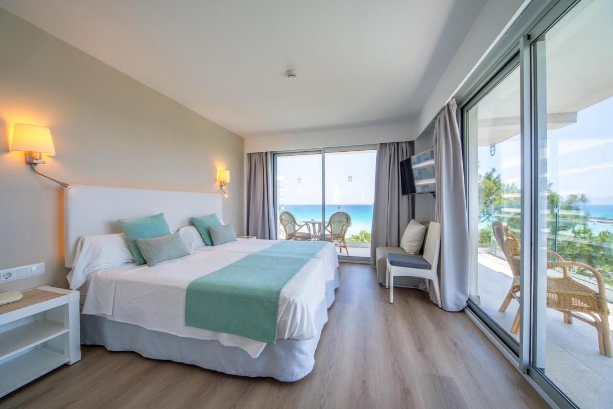 Cama o camas de una habitación en Playa Esperanza Resort Affiliated by Meliá