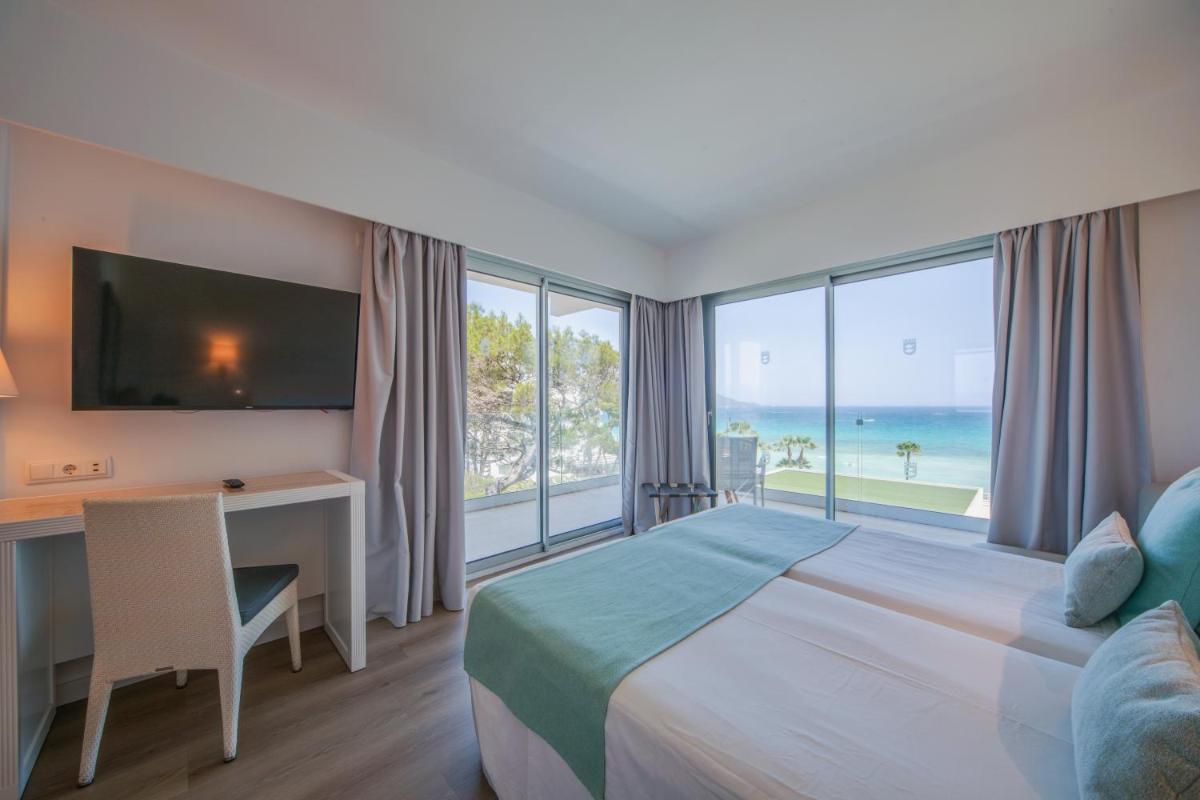 Cama o camas de una habitación en Playa Esperanza Resort Affiliated by Meliá