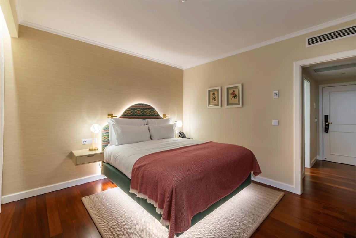 Uma cama ou camas num quarto em Pestana Quinta Perestrello