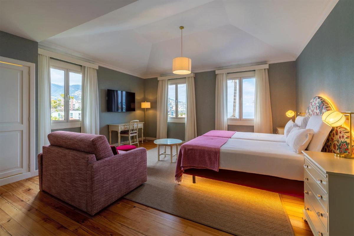 Uma cama ou camas num quarto em Pestana Quinta Perestrello