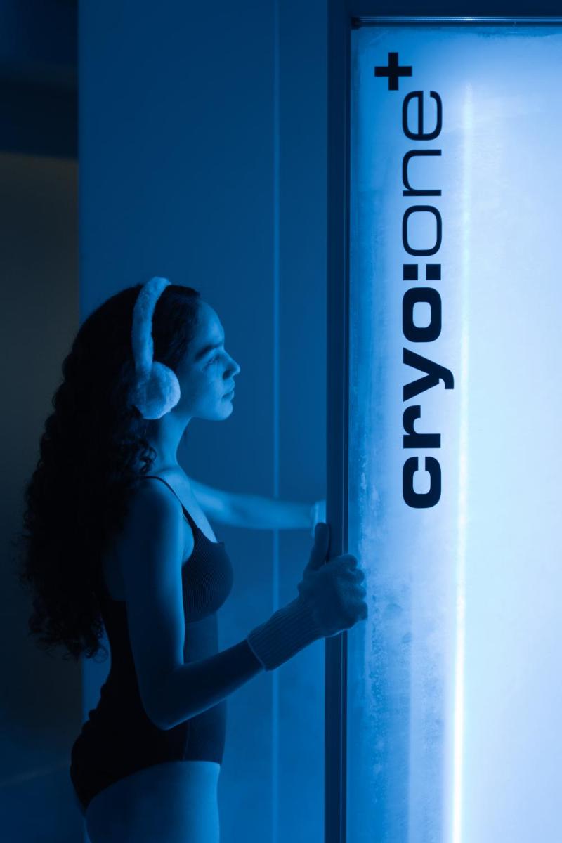 a woman standing next to a sign that reads tomorrow at Fairmont Mumbai in Mumbai