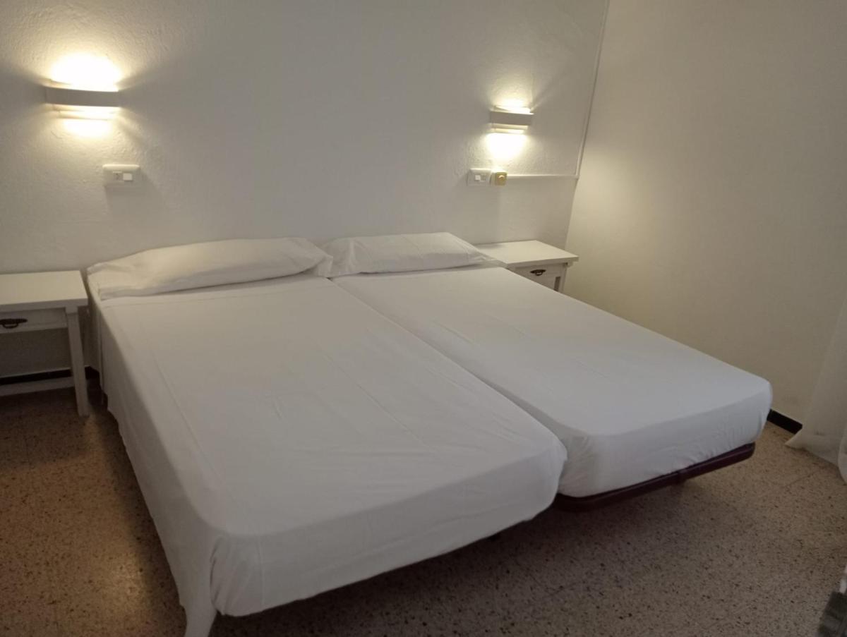 Cama o camas de una habitación en Hotel Rosa & Spa Begur