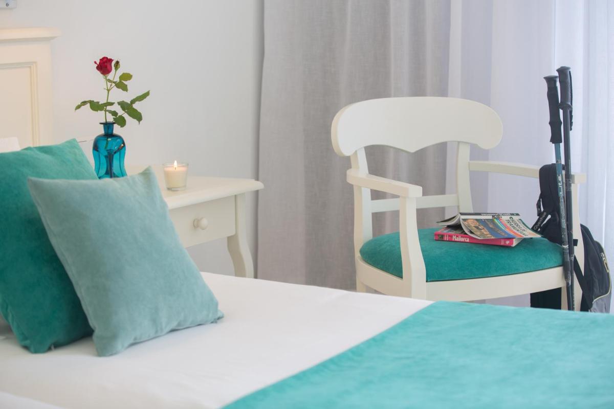Cama o camas de una habitación en Hotel Marina