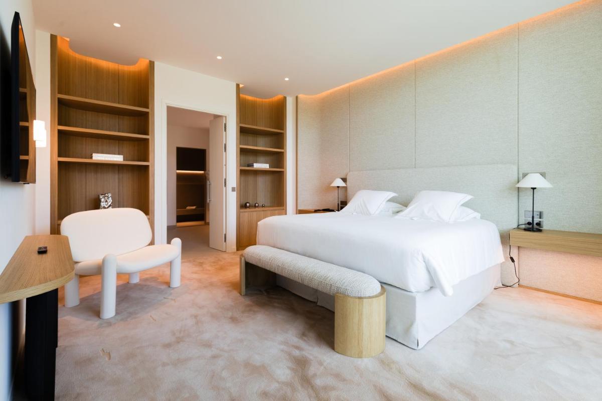 Un ou plusieurs lits dans un hébergement de l'établissement Domaine de Verchant & Spa - Relais & Châteaux