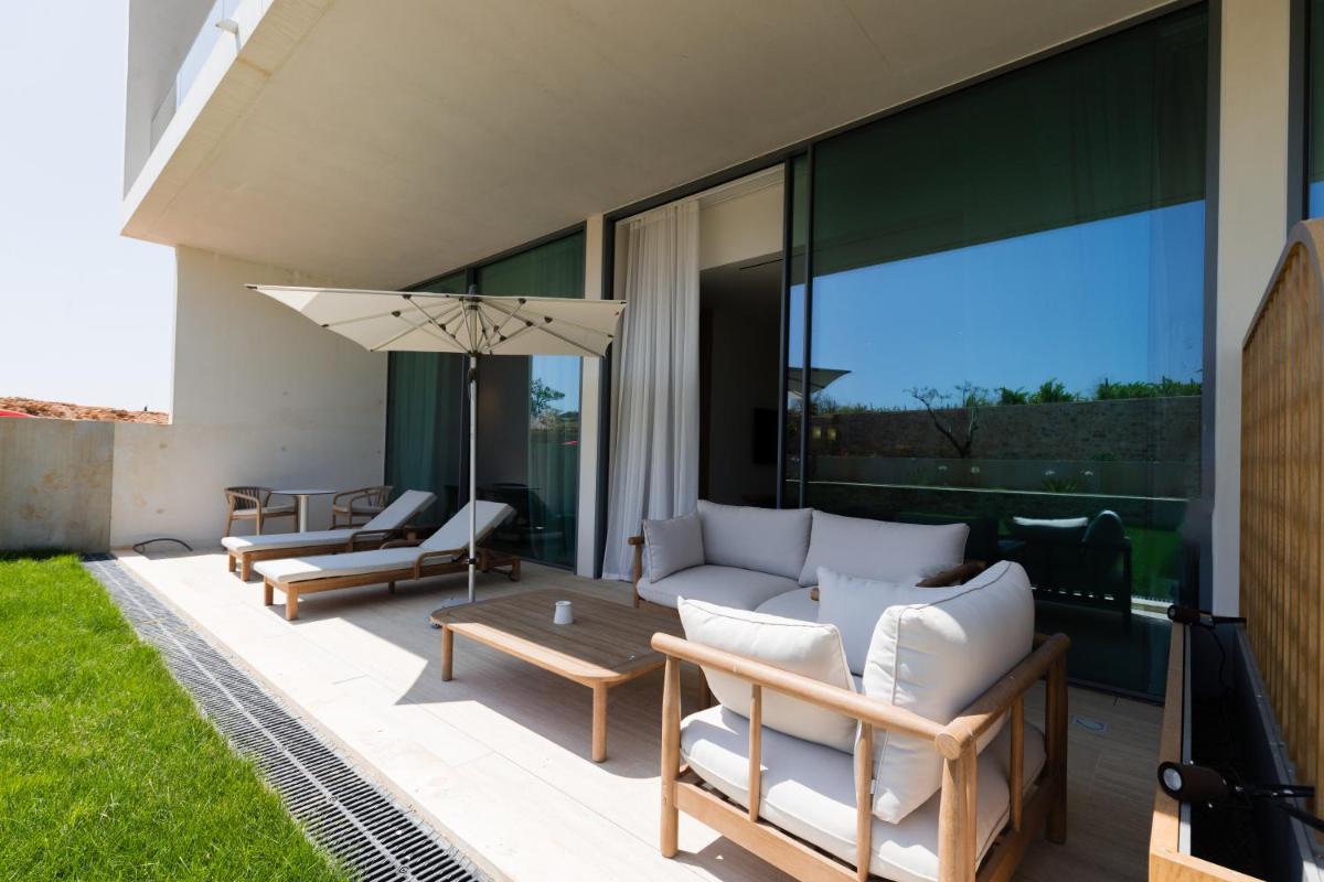 Coin salon dans l'établissement Domaine de Verchant & Spa - Relais & Châteaux
