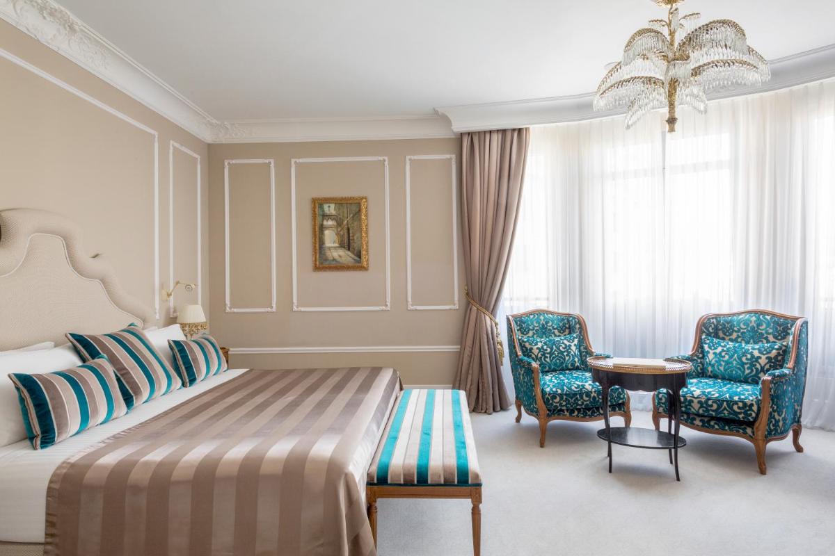 Cama o camas de una habitación en Hotel El Palace Barcelona