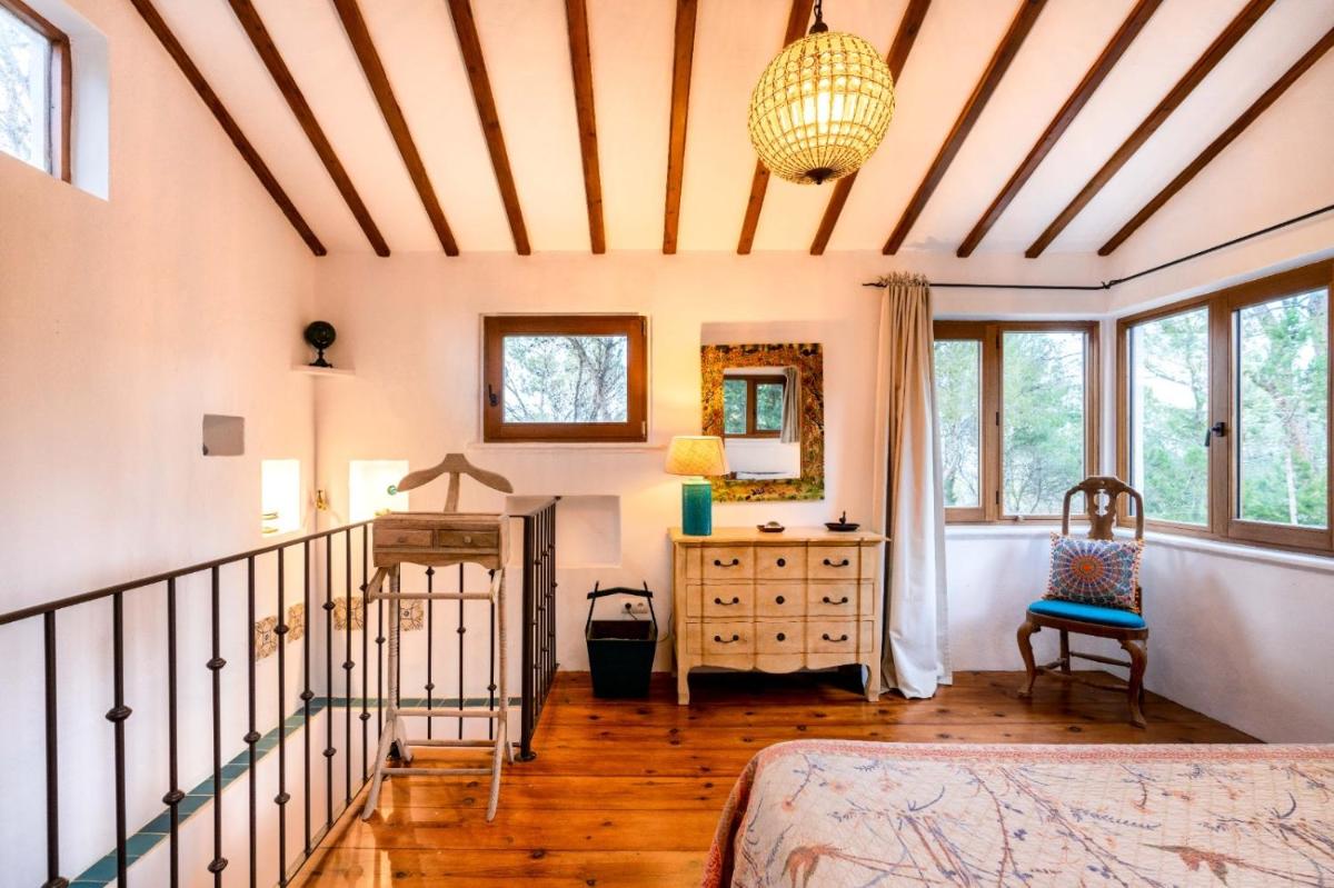 Cama o camas de una habitación en Agroturismo Can Talaias San CArlos