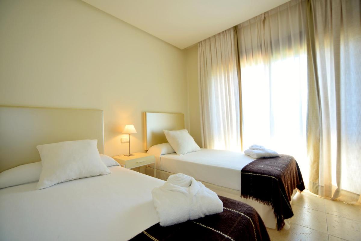 Cama o camas de una habitación en Aparthotel Novo Resort