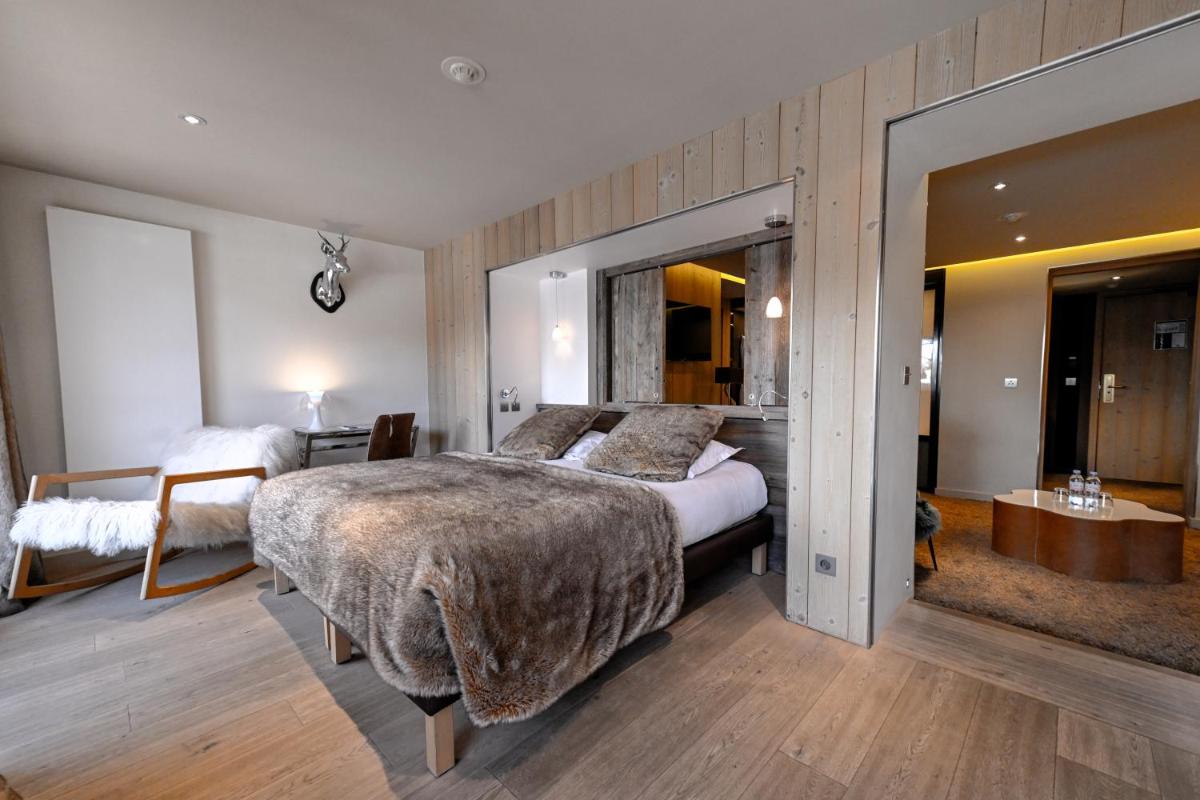 Un ou plusieurs lits dans un hébergement de l'établissement Hotel Tsanteleina