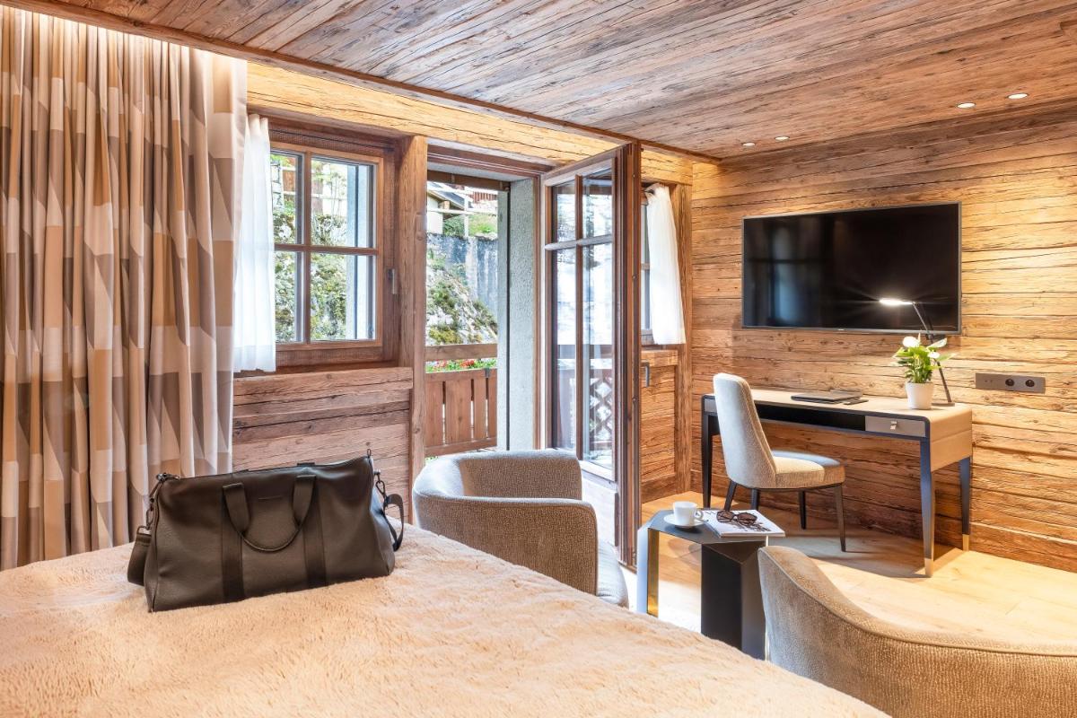 Télévision ou salle de divertissement dans l'établissement Armancette - The Leading Hotels of the World