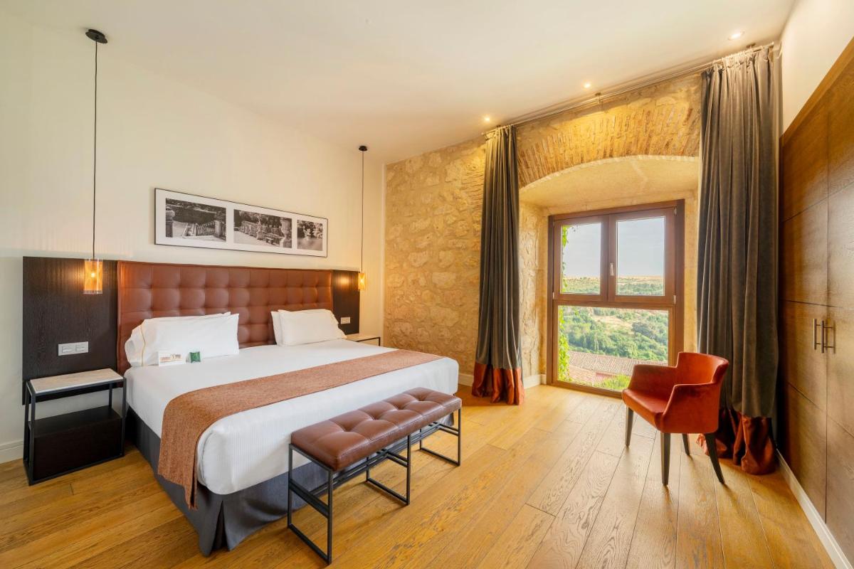 Cama o camas de una habitación en Áurea Convento Capuchinos by Eurostars Hotel Company