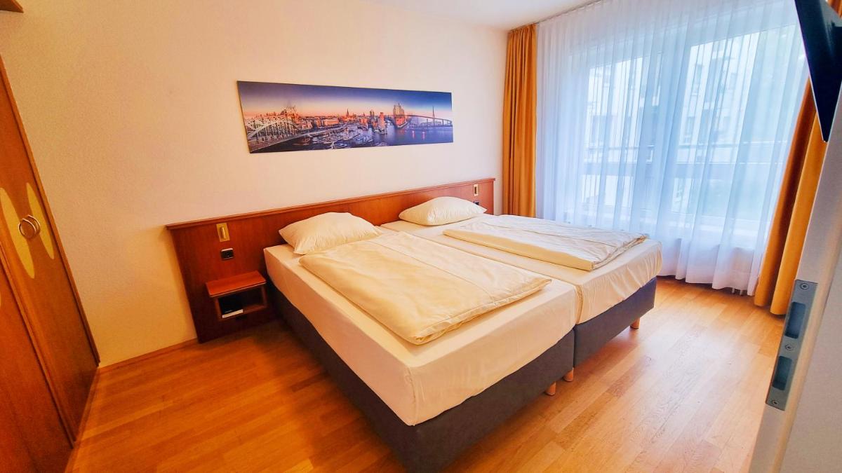 New Living Home Residenzhotel Hamburg - Housity
