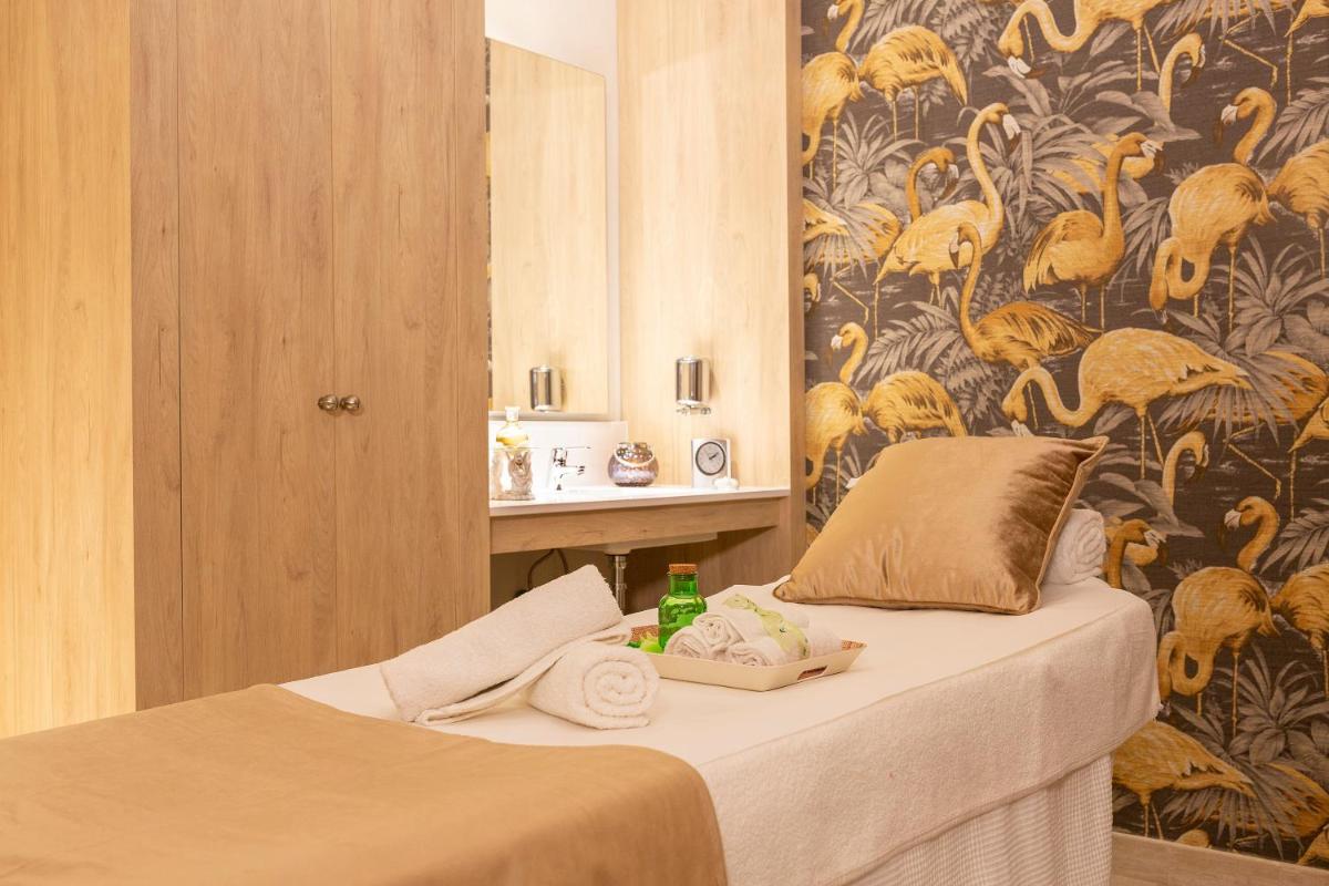 Cama o camas de una habitación en Hipotels Barrosa Park