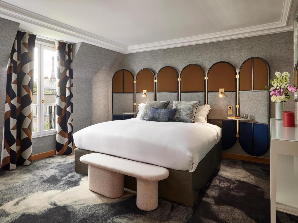 Un ou plusieurs lits dans un hébergement de l'établissement Sofitel Paris Baltimore Tour Eiffel