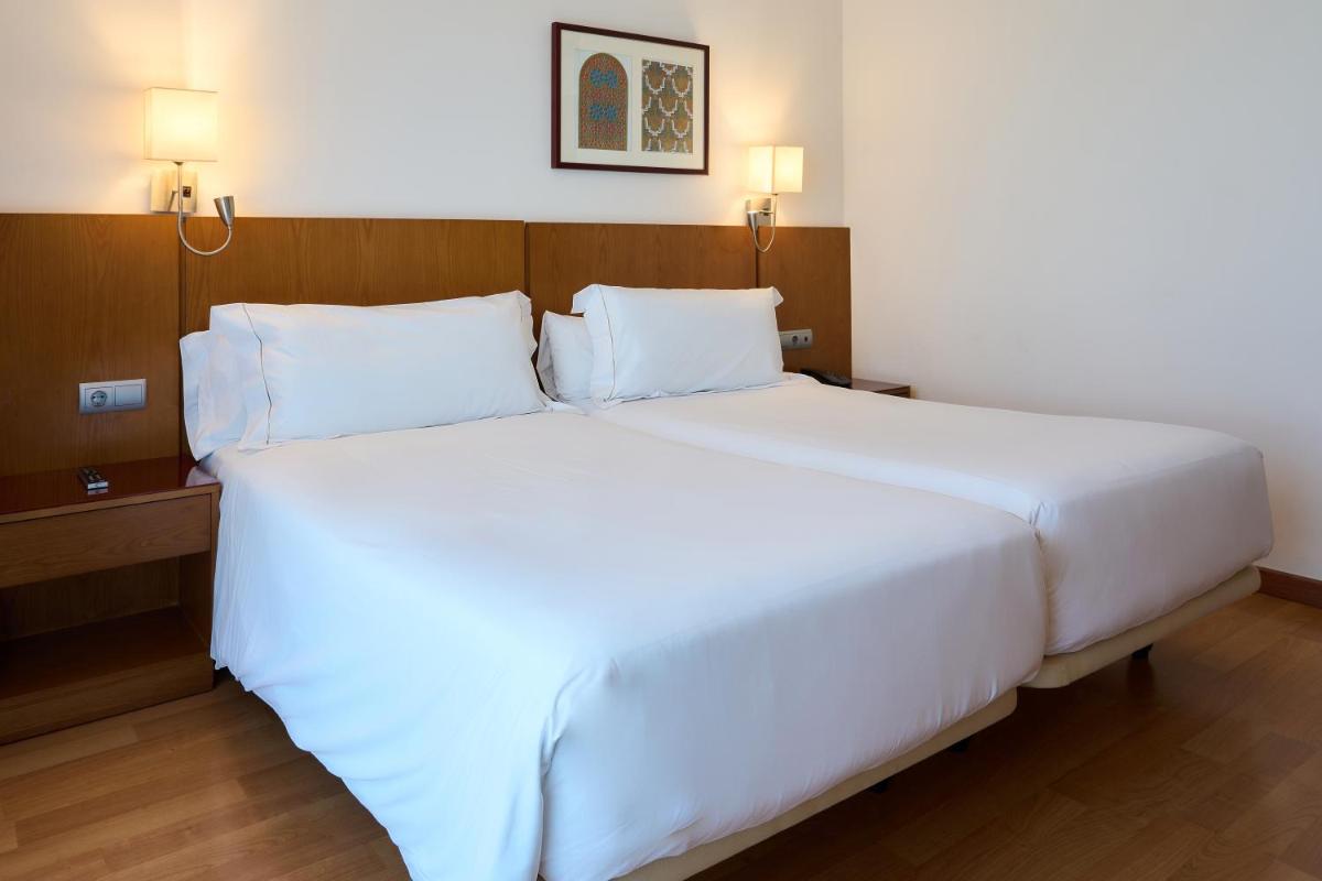 Cama o camas de una habitación en Senator Granada