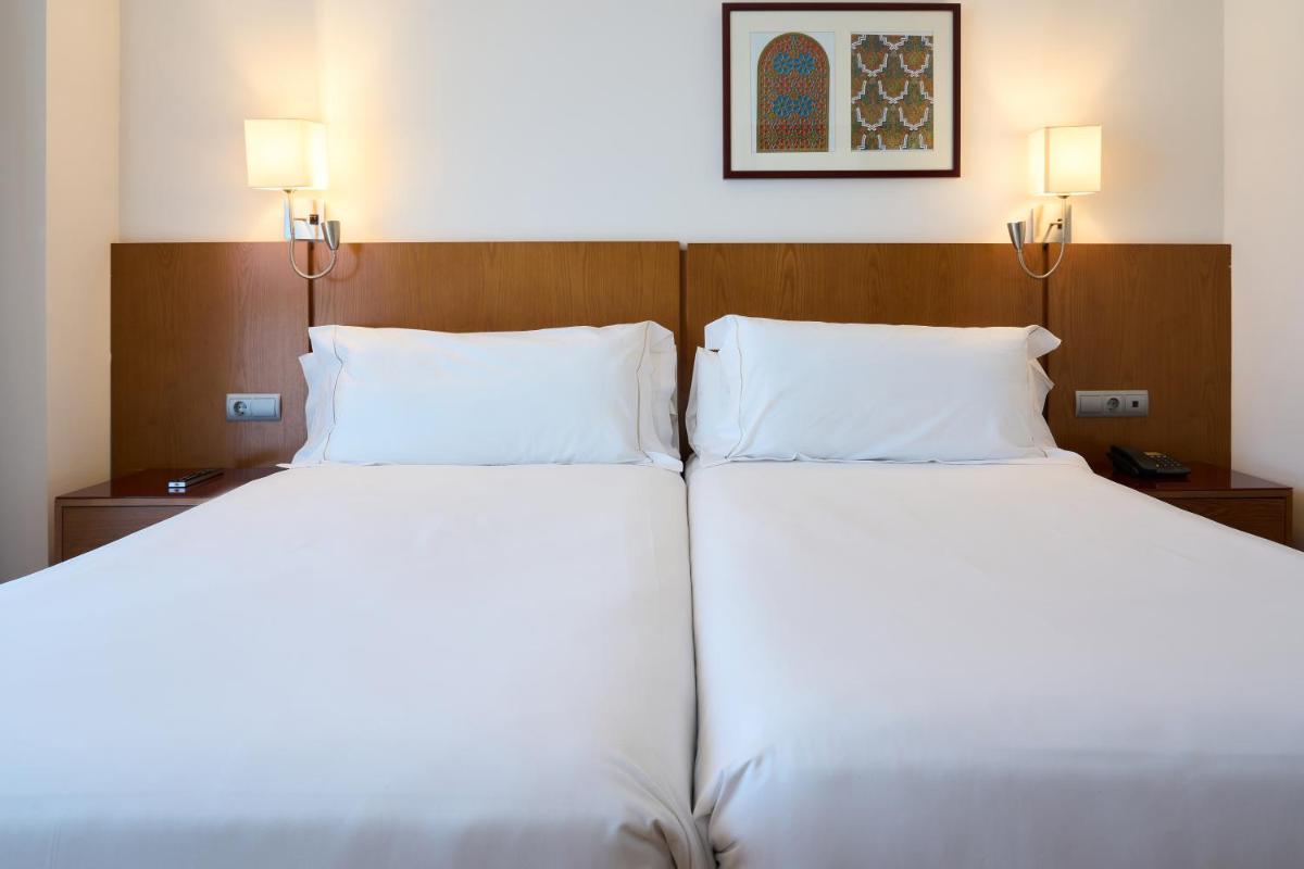 Cama o camas de una habitación en Senator Granada