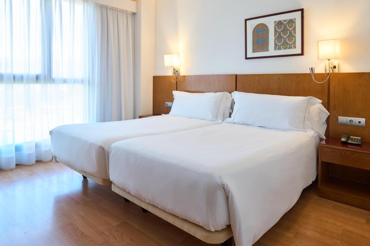 Cama o camas de una habitación en Senator Granada