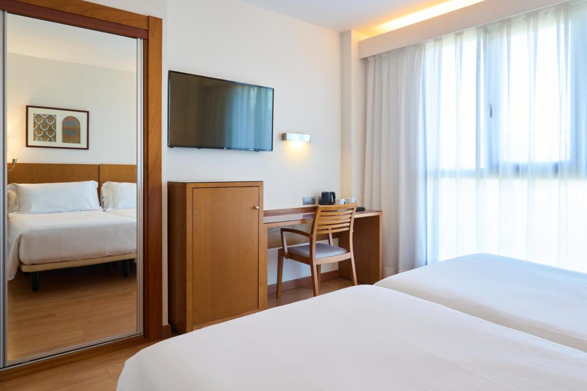 Cama o camas de una habitación en Senator Granada