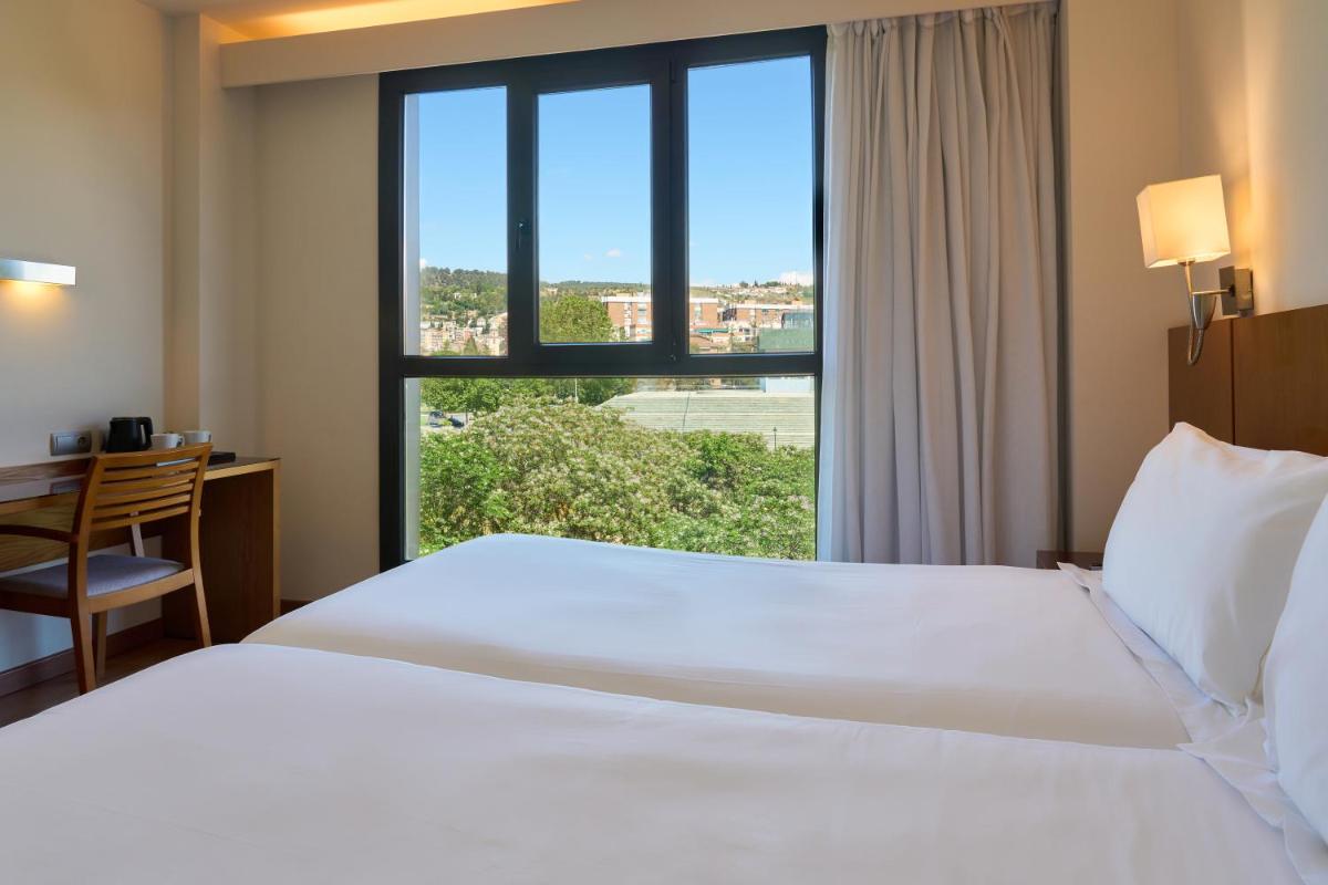 Cama o camas de una habitación en Senator Granada
