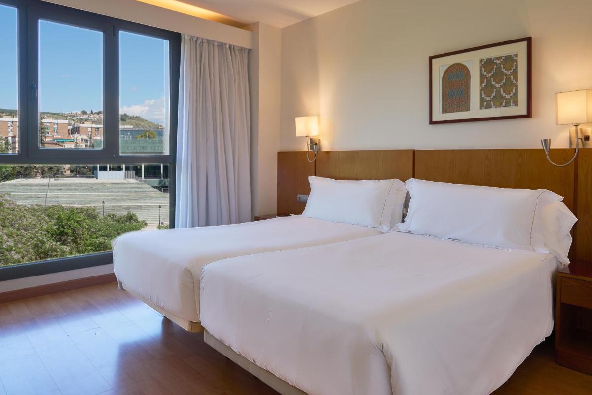 Cama o camas de una habitación en Senator Granada
