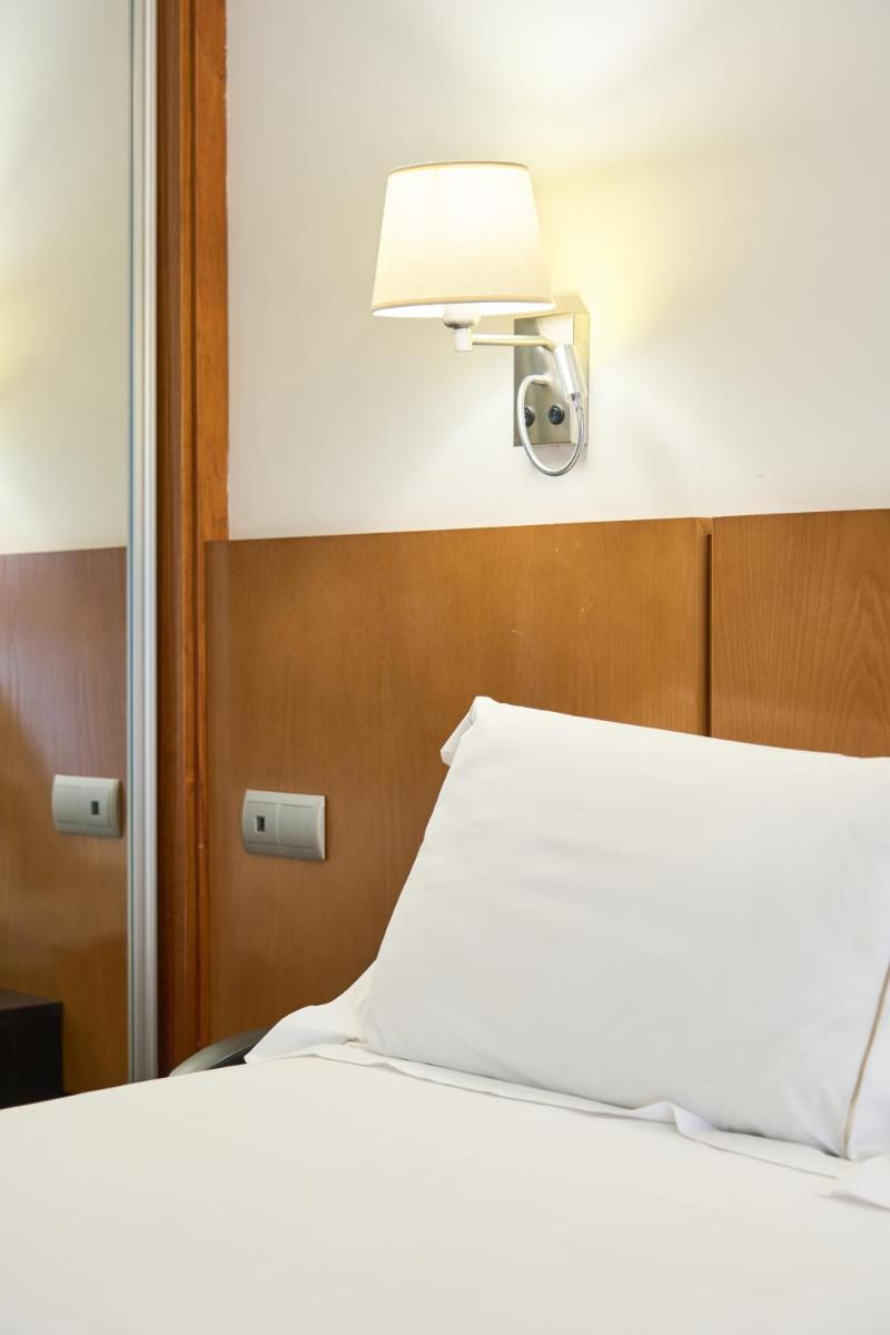 Cama o camas de una habitación en Senator Granada