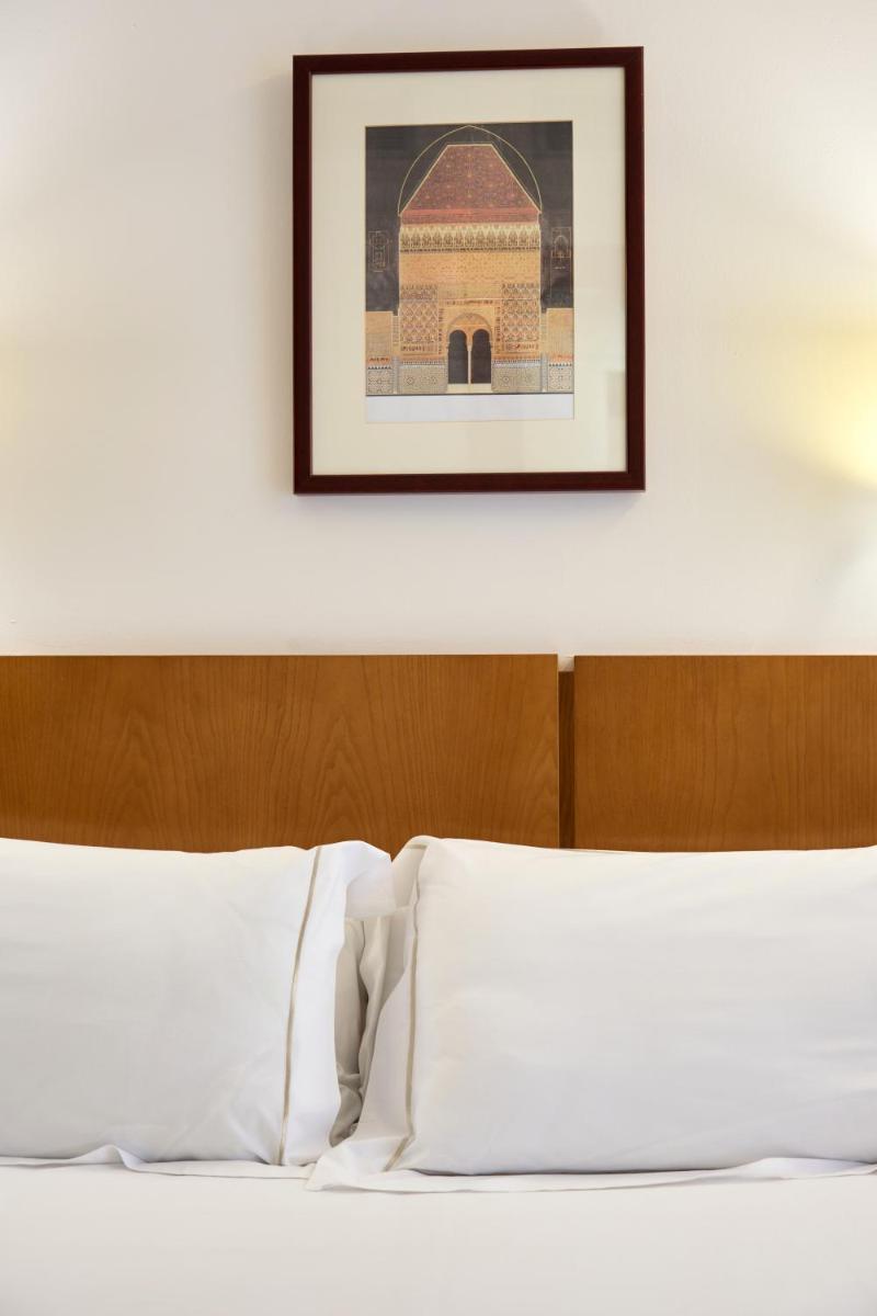 Cama o camas de una habitación en Senator Granada
