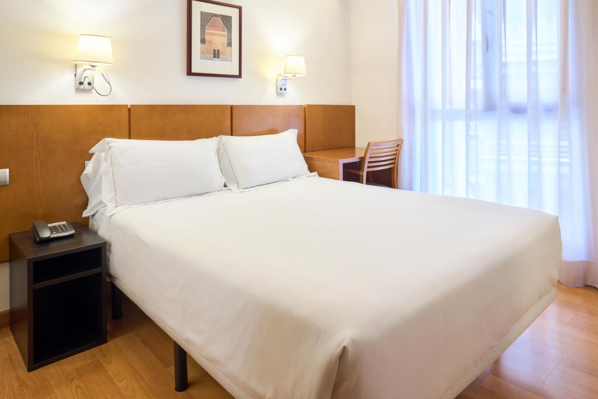 Cama o camas de una habitación en Senator Granada