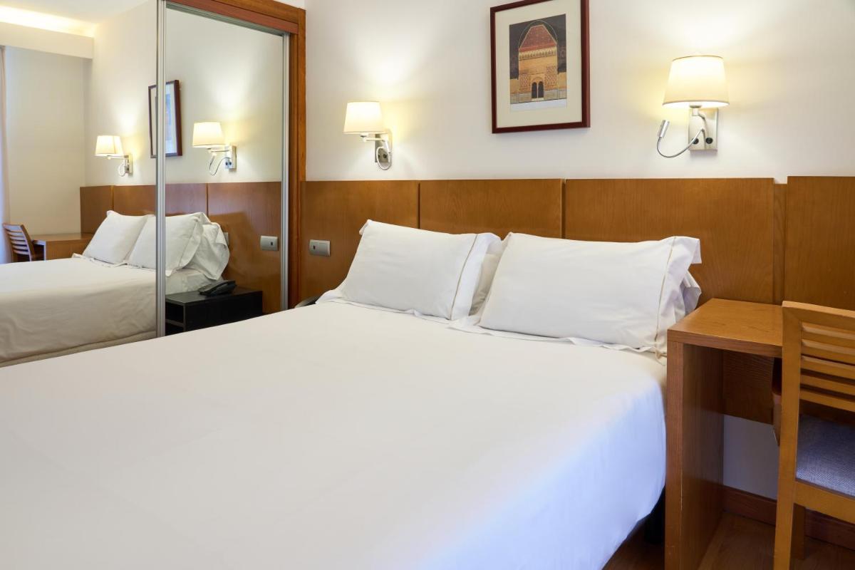 Cama o camas de una habitación en Senator Granada