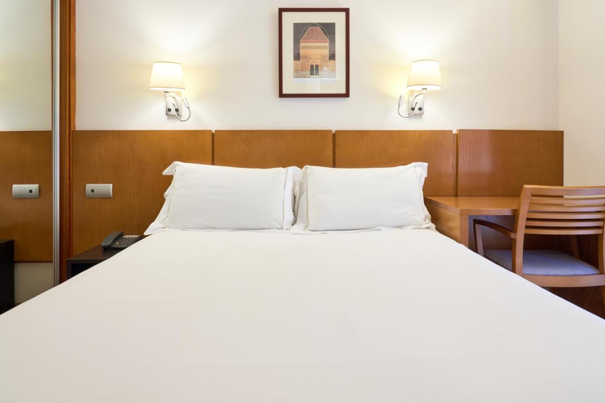Cama o camas de una habitación en Senator Granada