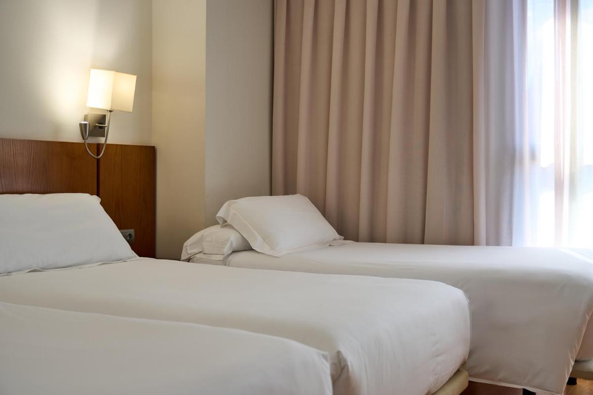 Cama o camas de una habitación en Senator Granada