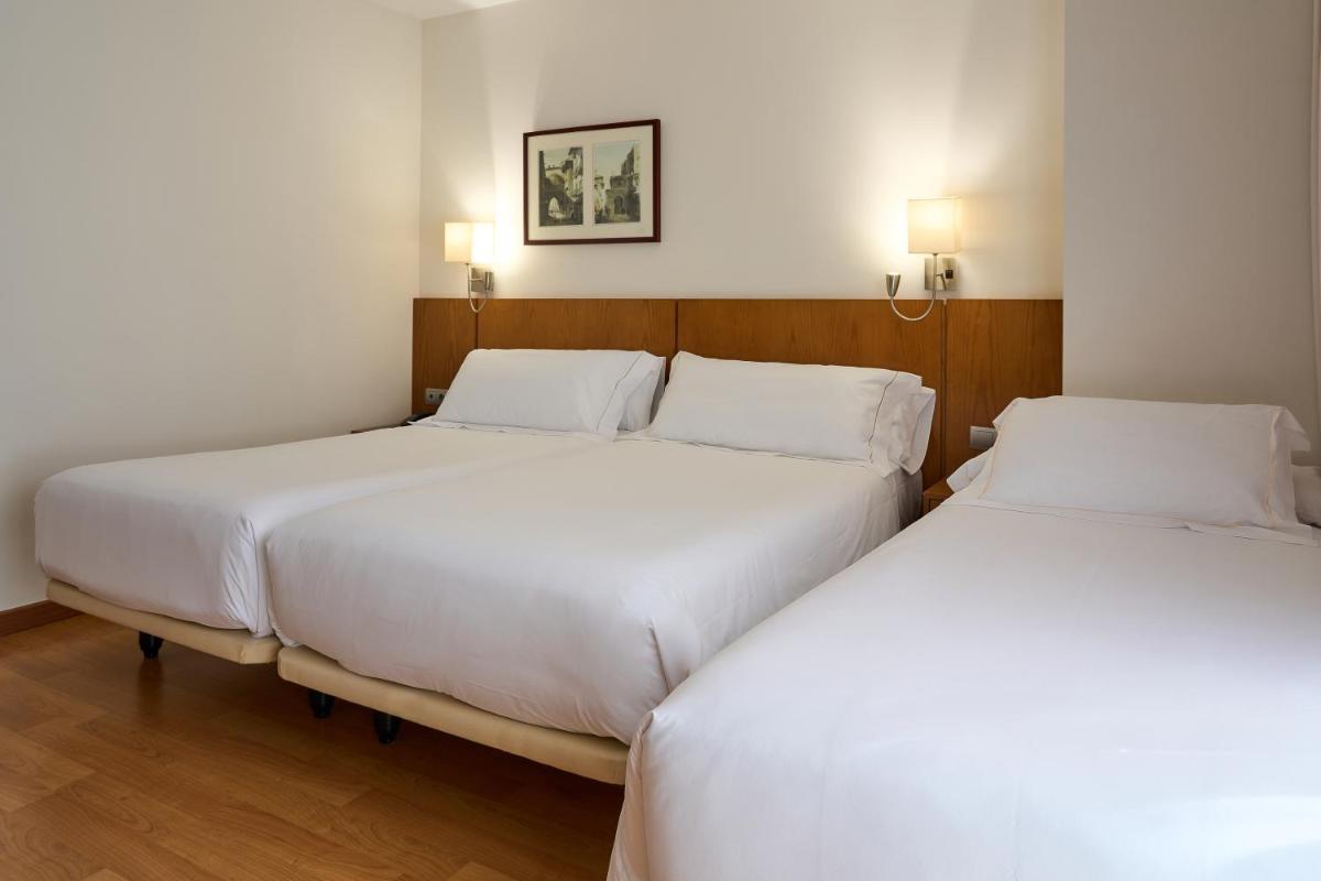 Cama o camas de una habitación en Senator Granada
