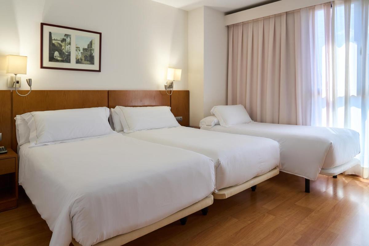 Cama o camas de una habitación en Senator Granada
