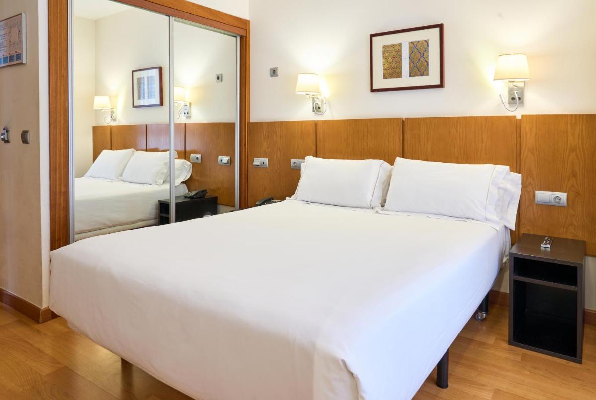 Cama o camas de una habitación en Senator Granada