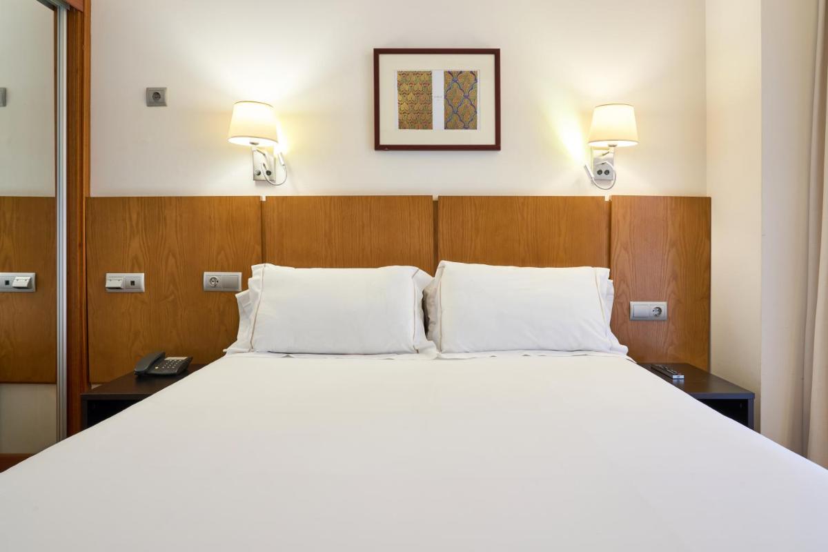 Cama o camas de una habitación en Senator Granada