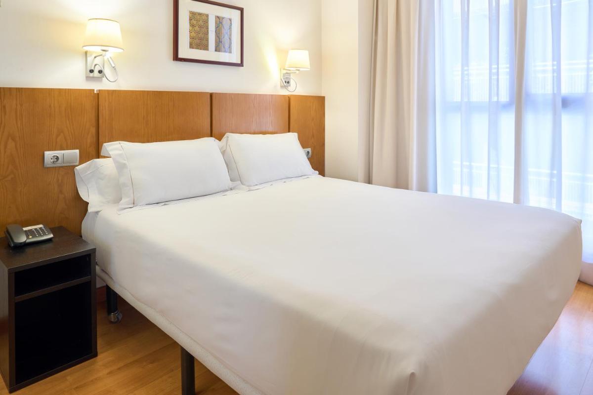 Cama o camas de una habitación en Senator Granada
