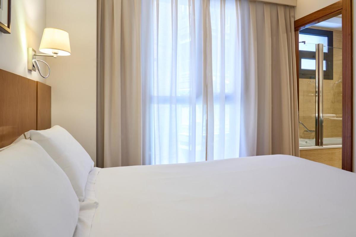 Cama o camas de una habitación en Senator Granada