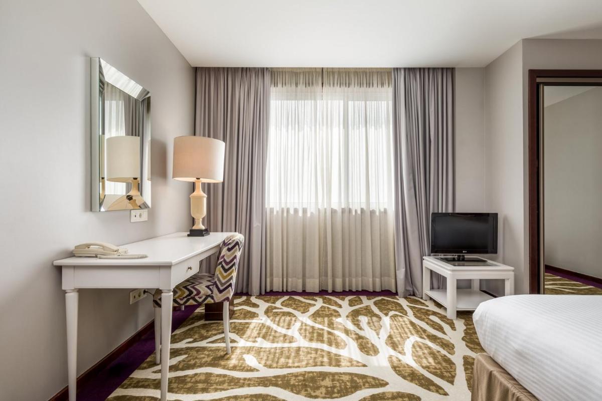 Uma cama ou camas num quarto em Holiday Inn Porto Gaia by IHG