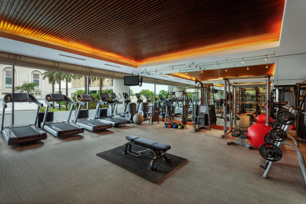 a gym with a lot of treadmills and machines at ITC Sonar, a Luxury Collection Hotel, Kolkata in Kolkata